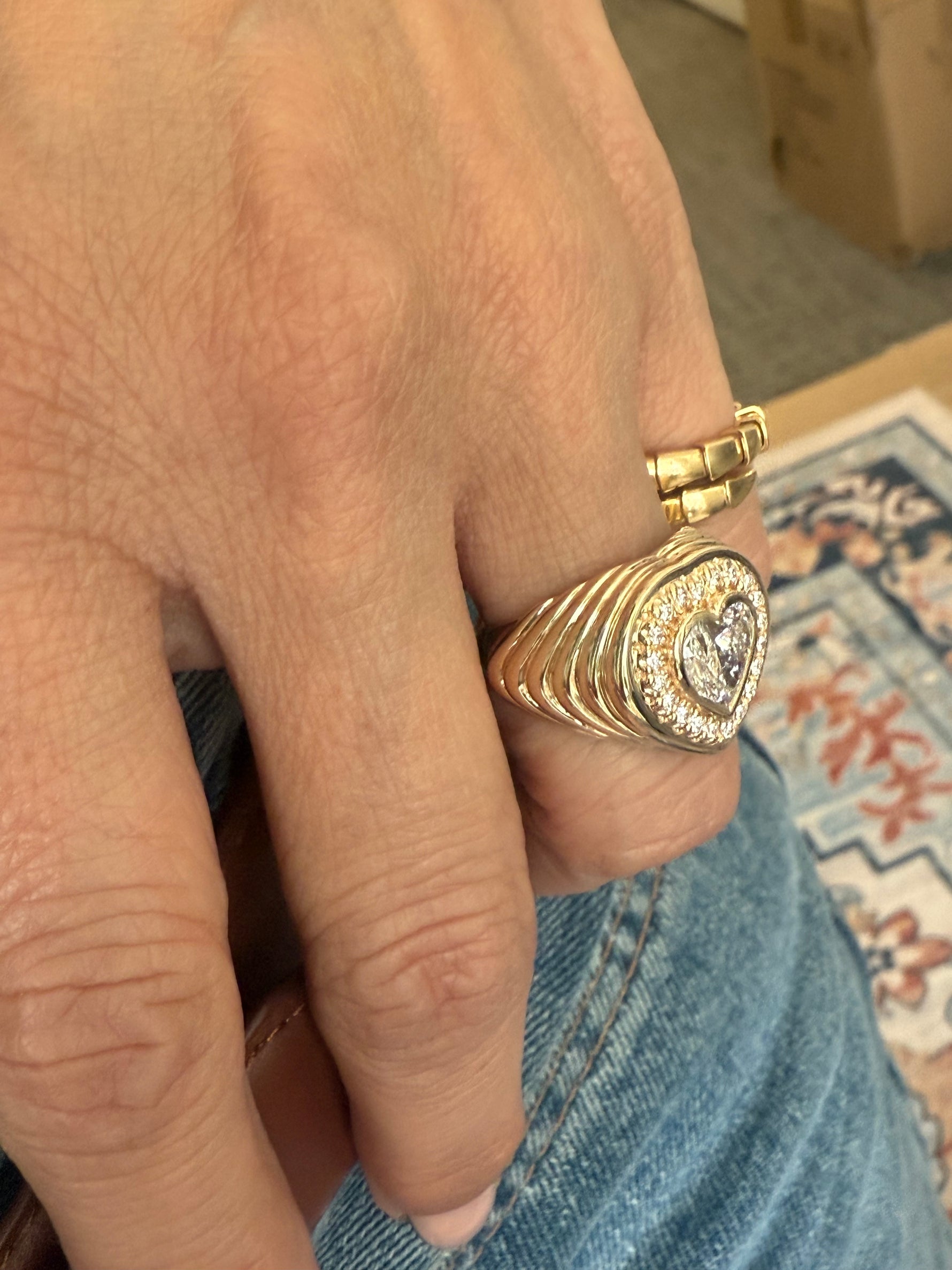 Side view of lab diamond heart ring designed by Miriam Santayana. 