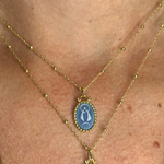 Blue agate image of La Caridad del Cobre, the patron saint of Cuba 