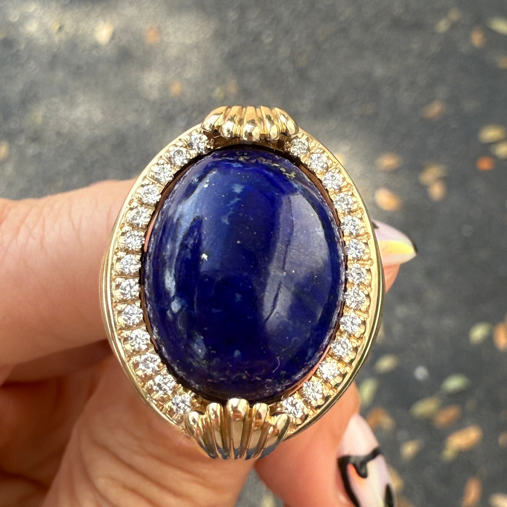 Statement ring in lapis and diamond in 14k yellow gold.