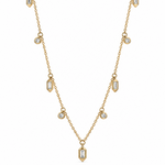 A gold chain necklace featuring multiple small baguette and round-cut diamonds arranged symmetrically on a white background.