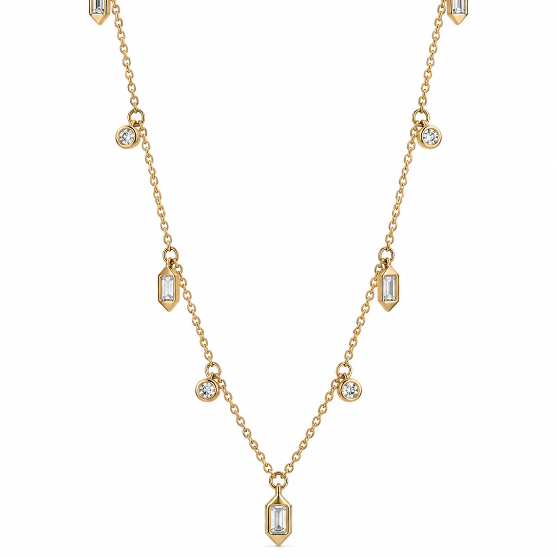 A gold chain necklace featuring multiple small baguette and round-cut diamonds arranged symmetrically on a white background.