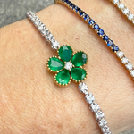 Emerald clover and diamond tennis bracelet in 18K white gold, matching set with clover ring