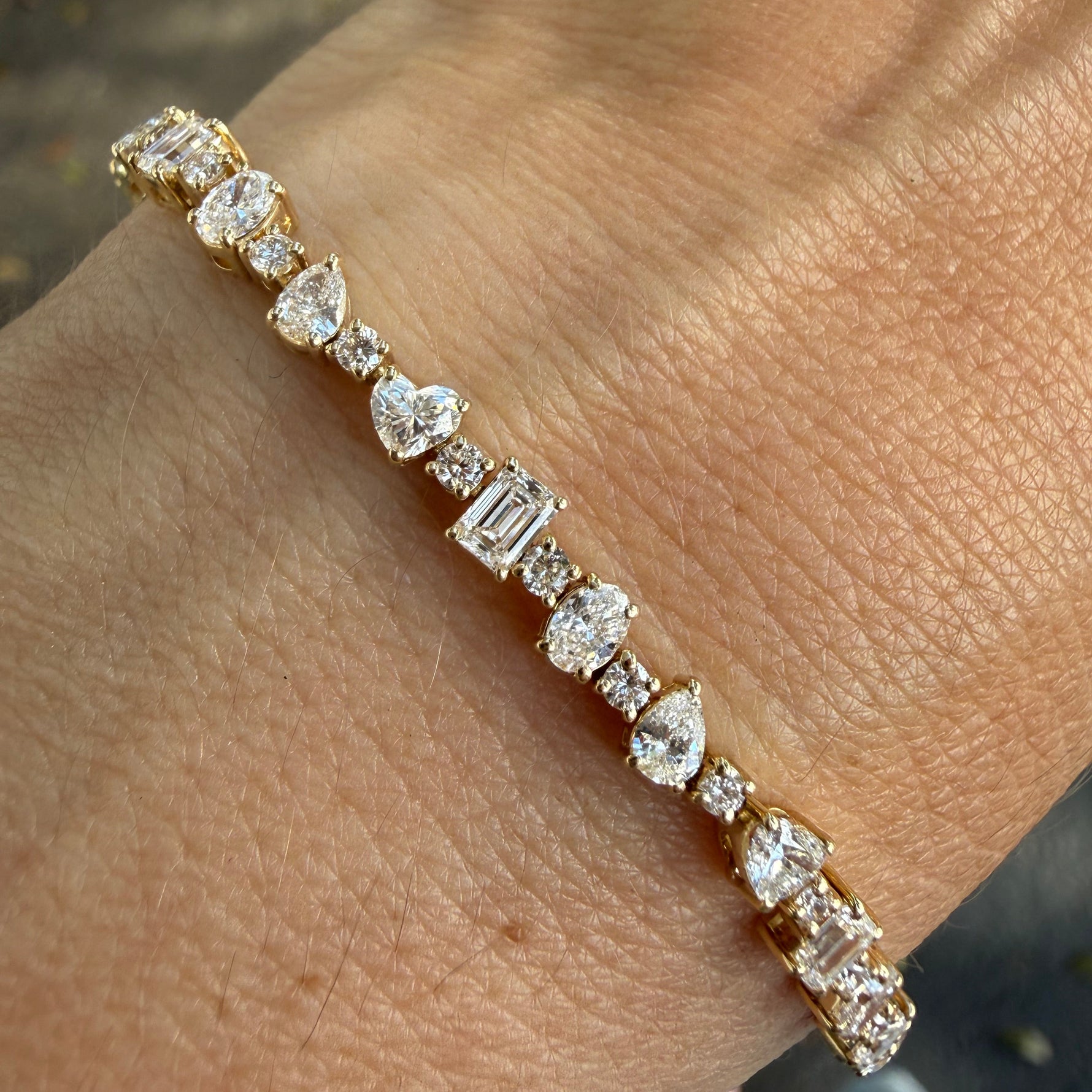multi shape lab diamond tennis bracelet on wrist