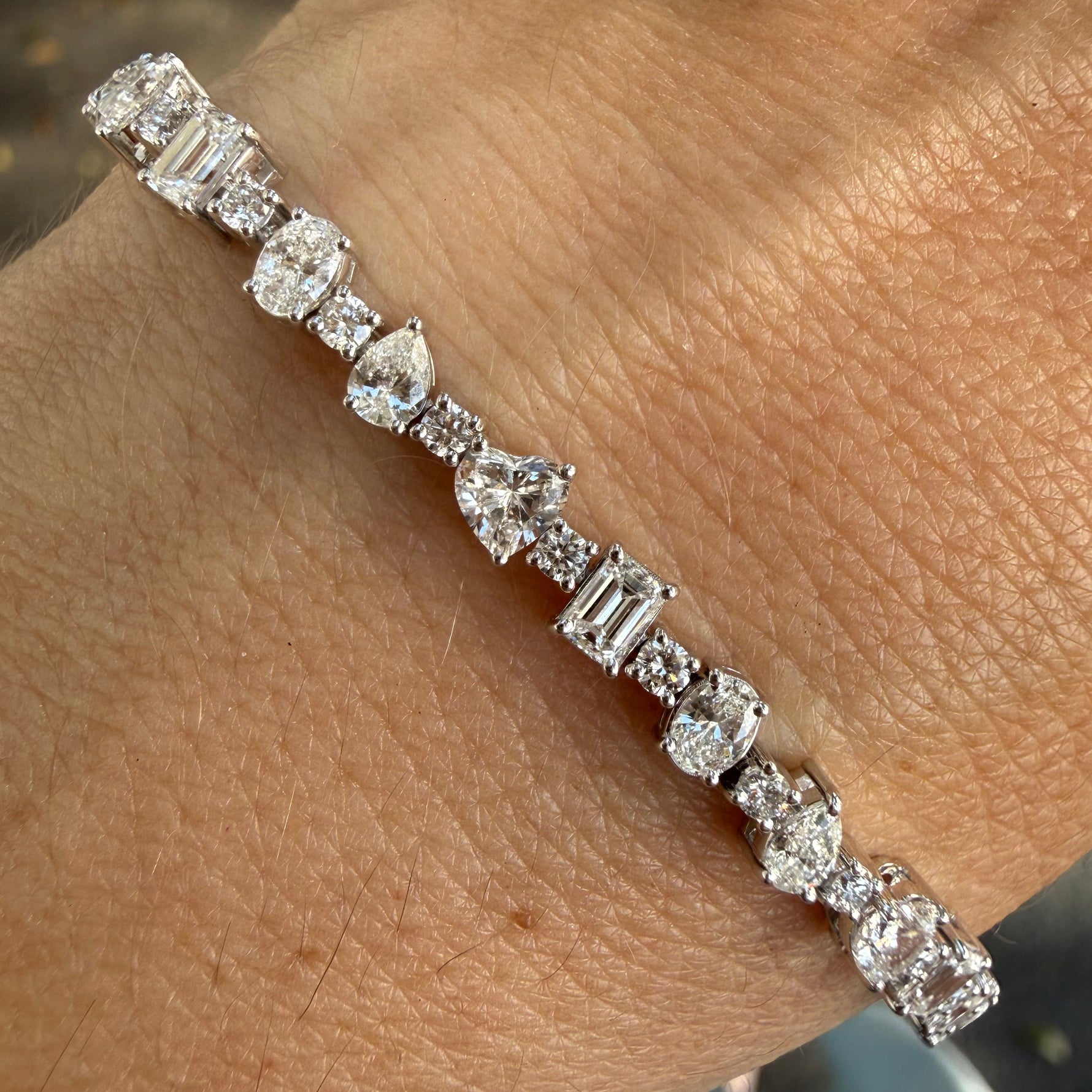 multi shape lab diamond tennis bracelet on wrist