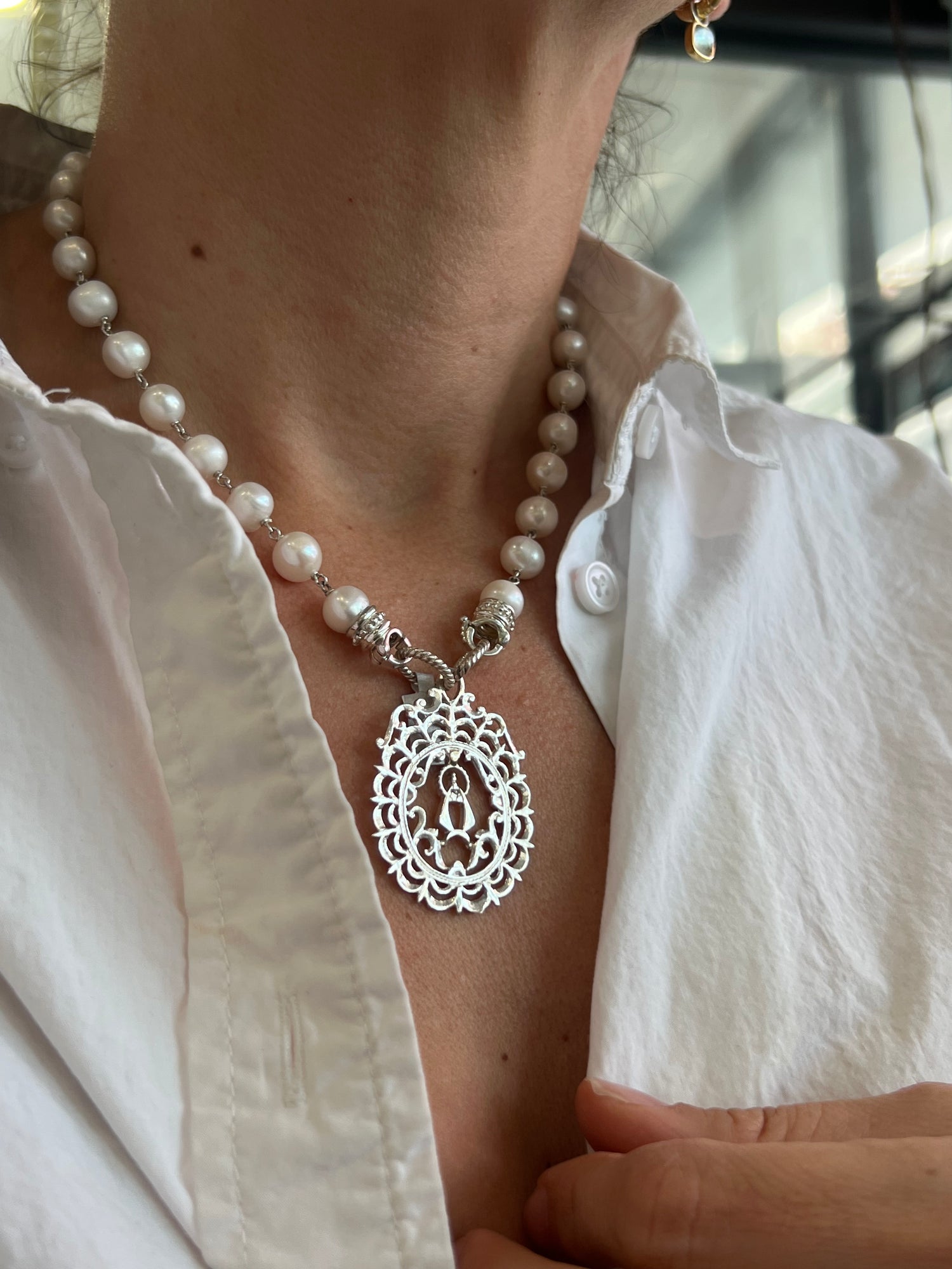 Santayana designed sterling silver virgencita pendant on interchangeable necklace.