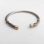 Silver twist bangle with pearl ends
