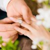 Couple - he is proposing marriage by giving a custom made ring