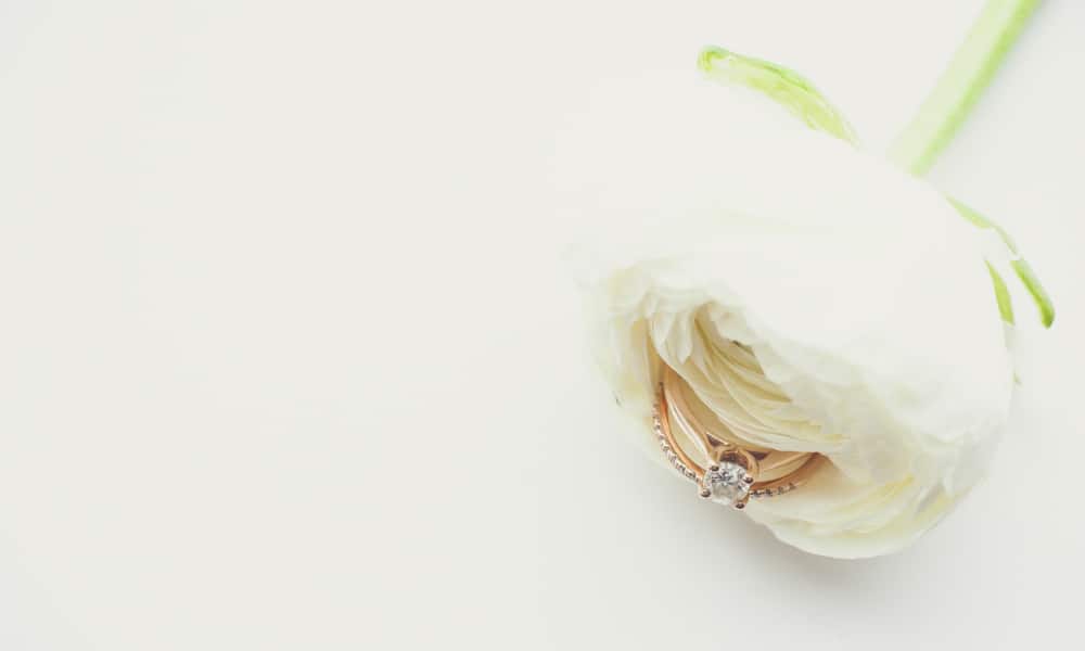 Rose Gold Wedding Ring in White Flower Petals