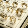 Golden rings with diamonds and other gemstones jewelry