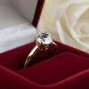Diamond wedding ring in a red gift box